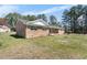 View of the home's front exterior and lawn with a manicured front yard at 916 Clayton Rd, Durham, NC 27703