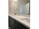 Bathroom featuring a double sink vanity with light countertops at 977 Lewis Rd, Zebulon, NC 27597