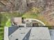 An aerial view of a home featuring a deck, backyard, and landscaping at 102 Stagville Ct, Cary, NC 27519