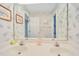 Bathroom vanity with dual sinks, large mirror, and patterned wallpaper at 102 Stagville Ct, Cary, NC 27519