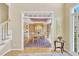 Elegant dining room with hardwood floors, chandelier, and custom cabinetry at 102 Stagville Ct, Cary, NC 27519