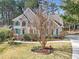Attractive brick home with seasonal landscaping adding character to its well-maintained exterior at 102 Stagville Ct, Cary, NC 27519