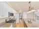 Bright kitchen with granite countertops, stainless steel appliances and modern finishes at 102 Stagville Ct, Cary, NC 27519
