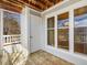 Private balcony with wood decking, offering an outdoor storage closet at 1051 Wirewood Dr # 202, Raleigh, NC 27605