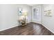 Bright bedroom featuring stylish flooring and a large window at 1051 Wirewood Dr # 202, Raleigh, NC 27605