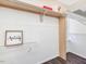 Spacious closet with white walls, wooden trim, and wire shelving for organized storage at 1051 Wirewood Dr # 202, Raleigh, NC 27605