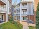 Multi-story residential buildings with balconies and well-maintained landscaping offer curb appeal at 1051 Wirewood Dr # 202, Raleigh, NC 27605