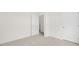 Spacious bedroom features neutral carpet and ample closet space at 108 Pisgah St, Sanford, NC 27330