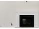 Bright living room features a modern fireplace at 108 Pisgah St, Sanford, NC 27330