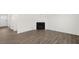 Bright living room features hardwood flooring and fireplace at 108 Pisgah St, Sanford, NC 27330