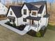 Beautiful new construction home with white siding, black trim, and a welcoming front porch at 110 Black Swan Dr, Youngsville, NC 27596