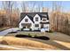 Charming new construction two-story home featuring professional landscaping at 110 Black Swan Dr, Youngsville, NC 27596