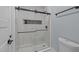 Modern bathroom with a glass enclosed shower and shower niche at 110 Black Swan Dr, Youngsville, NC 27596