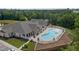 Aerial view of community pool with ample lounge seating and meticulously maintained landscaping at 1131 Pate Farm Ln, Durham, NC 27703