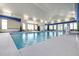 Bright indoor pool area with ample seating, natural light, and easy accessibility features at 1131 Pate Farm Ln, Durham, NC 27703