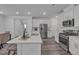 Well-appointed kitchen featuring stainless steel appliances, ample counter space, and modern finishes at 1131 Pate Farm Ln, Durham, NC 27703