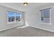Bright bedroom with two large windows offering neighborhood views and plenty of natural light at 1160 Craigmeade Dr, Morrisville, NC 27560