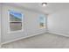 Clean, bright bedroom with large windows offering neighborhood views and ample natural light at 1160 Craigmeade Dr, Morrisville, NC 27560