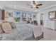 Bright main bedroom with a view of the woods and two chairs at 1160 Craigmeade Dr, Morrisville, NC 27560