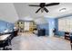 Large bedroom with desk area, shelves, carpet floors, and natural lighting at 1188 The Preserve Trl, Chapel Hill, NC 27517