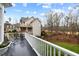 Relax on the deck with views of the backyard, perfect for entertaining or unwinding in a serene outdoor setting at 1188 The Preserve Trl, Chapel Hill, NC 27517