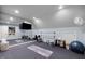 Bright workout room with mirrored wall, barre, and fitness equipment on a gray floor at 1188 The Preserve Trl, Chapel Hill, NC 27517