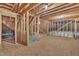Unfinished attic space featuring exposed rafters and OSB subflooring, ready for customization at 1220 Bethlehem Rd, Knightdale, NC 27545