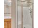 Bathroom featuring a glass-enclosed shower and a vanity with double sinks at 1220 Bethlehem Rd, Knightdale, NC 27545