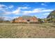 Beautiful brick house with mature trees and a well-manicured lawn in a quiet neighborhood at 1220 Bethlehem Rd, Knightdale, NC 27545
