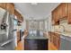 Spacious kitchen featuring granite countertops, stainless appliances, and central island at 1220 Bethlehem Rd, Knightdale, NC 27545