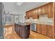 Modern kitchen featuring custom cabinets, granite countertops, and a center island at 1220 Bethlehem Rd, Knightdale, NC 27545