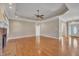 Bright living room with hardwood floors, fireplace and chandelier at 1220 Bethlehem Rd, Knightdale, NC 27545