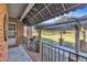 Brick patio with a covered awning and pergola, offering outdoor living space at 1220 Bethlehem Rd, Knightdale, NC 27545