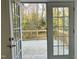 View of the natural wooded setting from the private wooden back deck at 123 E Weatherspoon St, Sanford, NC 27330