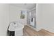 Bathroom featuring a stand alone tub, enclosed shower, modern fixtures and tile floors at 123 E Weatherspoon St, Sanford, NC 27330
