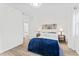 Cozy bedroom featuring decor, accent lighting, and a comfortable bed with blue throw at 123 E Weatherspoon St, Sanford, NC 27330