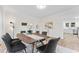 Stylish dining room with modern decor, natural light, and comfortable seating at 123 E Weatherspoon St, Sanford, NC 27330