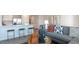 Inviting living room featuring modern decor, a gray sofa, and bright natural light at 158 Holton St, Smithfield, NC 27577