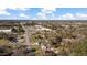 Aerial view of a residential neighborhood with mature trees and various building structures at 1721 Raleigh Rd, Henderson, NC 27536