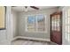 Bright bedroom with a large window offering a view of the outdoors at 1721 Raleigh Rd, Henderson, NC 27536
