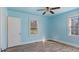 Comfortable bedroom with laminate floors, complemented by two windows for natural light at 1721 Raleigh Rd, Henderson, NC 27536