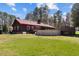 Exterior of home showing large backyard and above ground pool at 1796 Steel Bridge Rd, Sanford, NC 27330