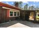 Backyard deck with outside dining, screened in porch and hot tub at 1796 Steel Bridge Rd, Sanford, NC 27330