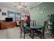 Traditional dining room with elegant table and chairs adjacent to the living room at 1796 Steel Bridge Rd, Sanford, NC 27330
