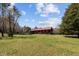Well-maintained single-Gathering home with a spacious lawn and mature trees at 1796 Steel Bridge Rd, Sanford, NC 27330