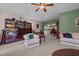 Inviting living room featuring a large display cabinet and comfortable seating arrangement at 1796 Steel Bridge Rd, Sanford, NC 27330
