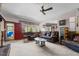 Comfortable living room with plush sofas, a fireplace, and plenty of natural light at 1796 Steel Bridge Rd, Sanford, NC 27330