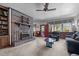 Spacious living room features a fireplace, comfortable seating, and ample natural light at 1796 Steel Bridge Rd, Sanford, NC 27330