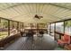 Covered wooden porch with ceiling fan, perfect for enjoying the outdoors at 1796 Steel Bridge Rd, Sanford, NC 27330