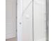 Bright hallway leads to a modern bathroom with glass enclosed shower stall at 1802 Brim Dr, Haw River, NC 27258
